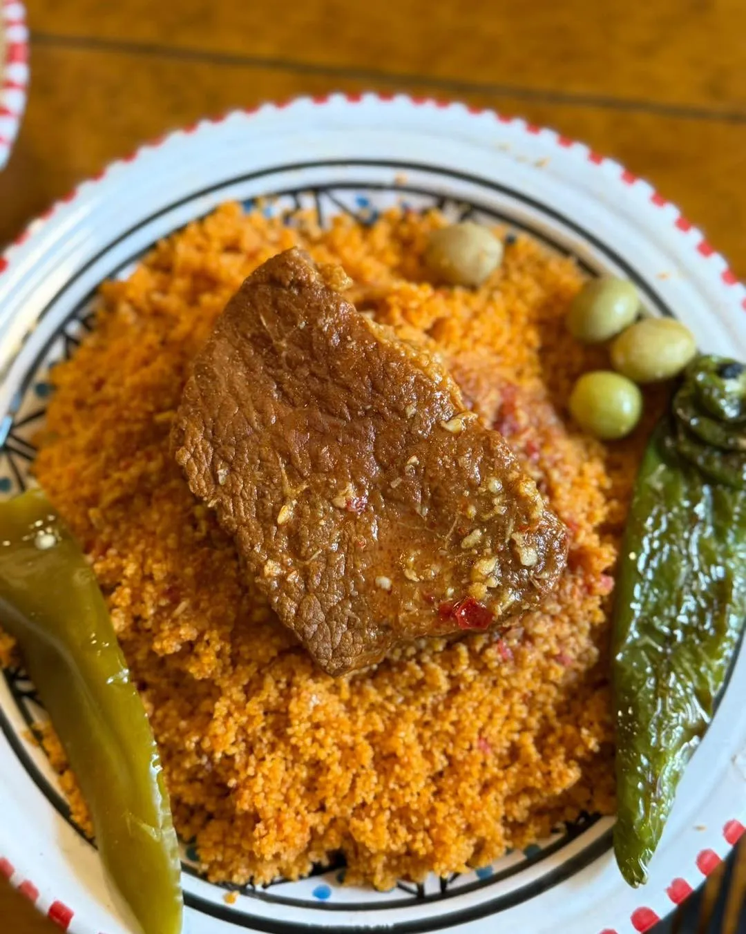 Smassem couscous with sardines and Sahel green vegetables